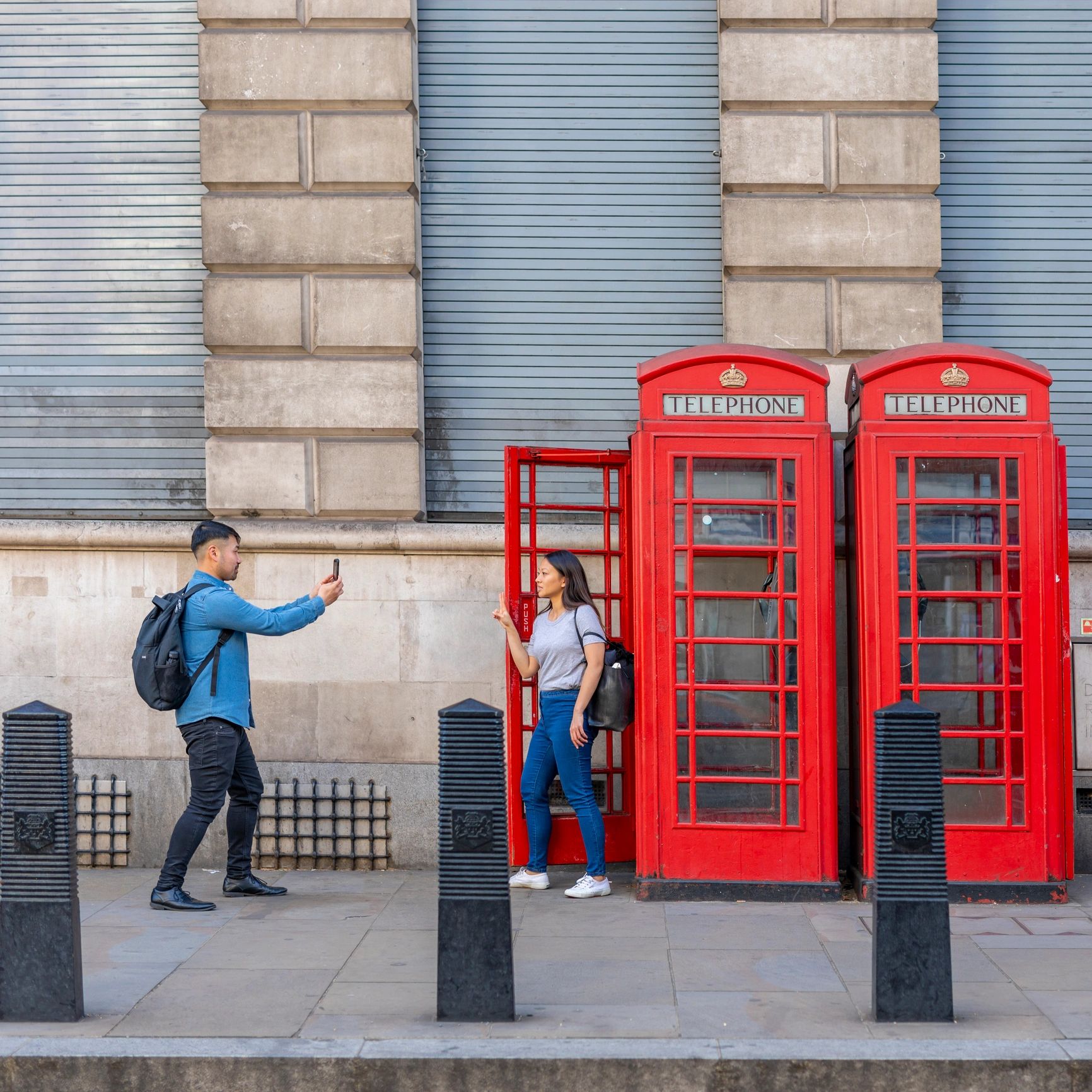 Travelers taking a selfie outdoors