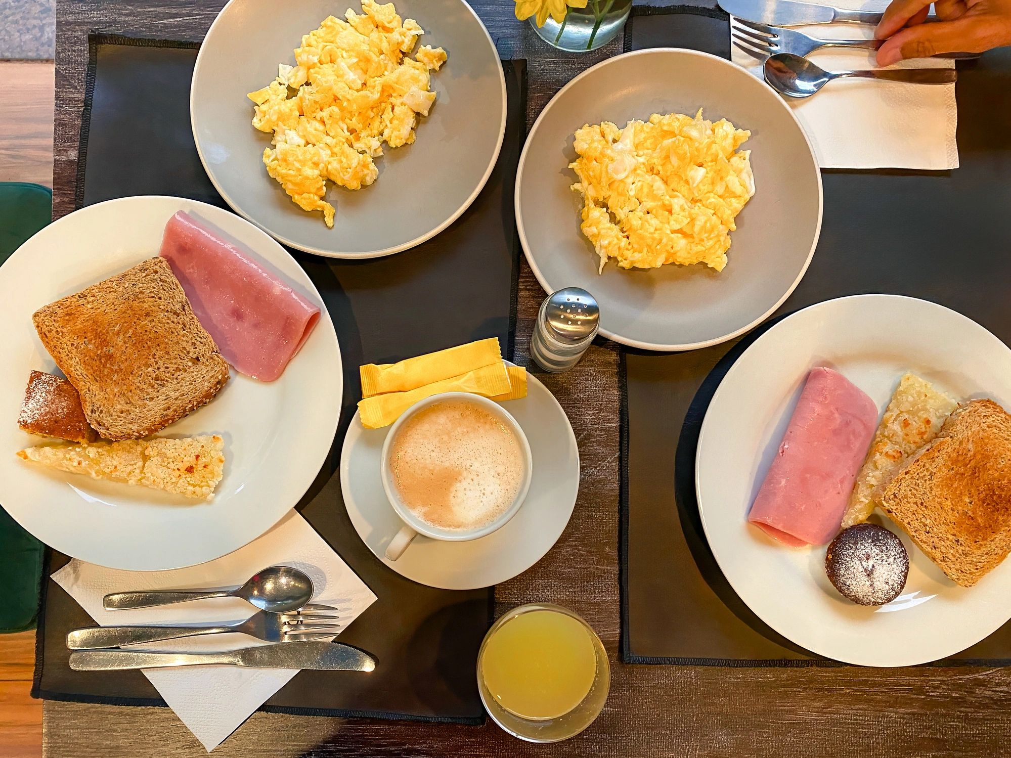 Hotel breakfast spread on a table